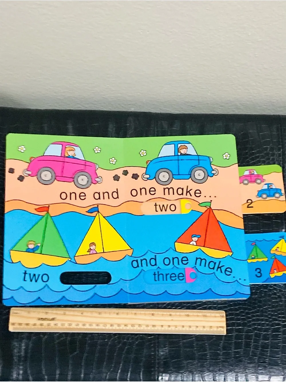1-2-3 A Slide-and-See Counting Book by Learning Through Play